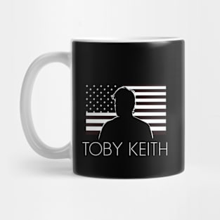 Toby Keith against a backdrop of the American flag Mug